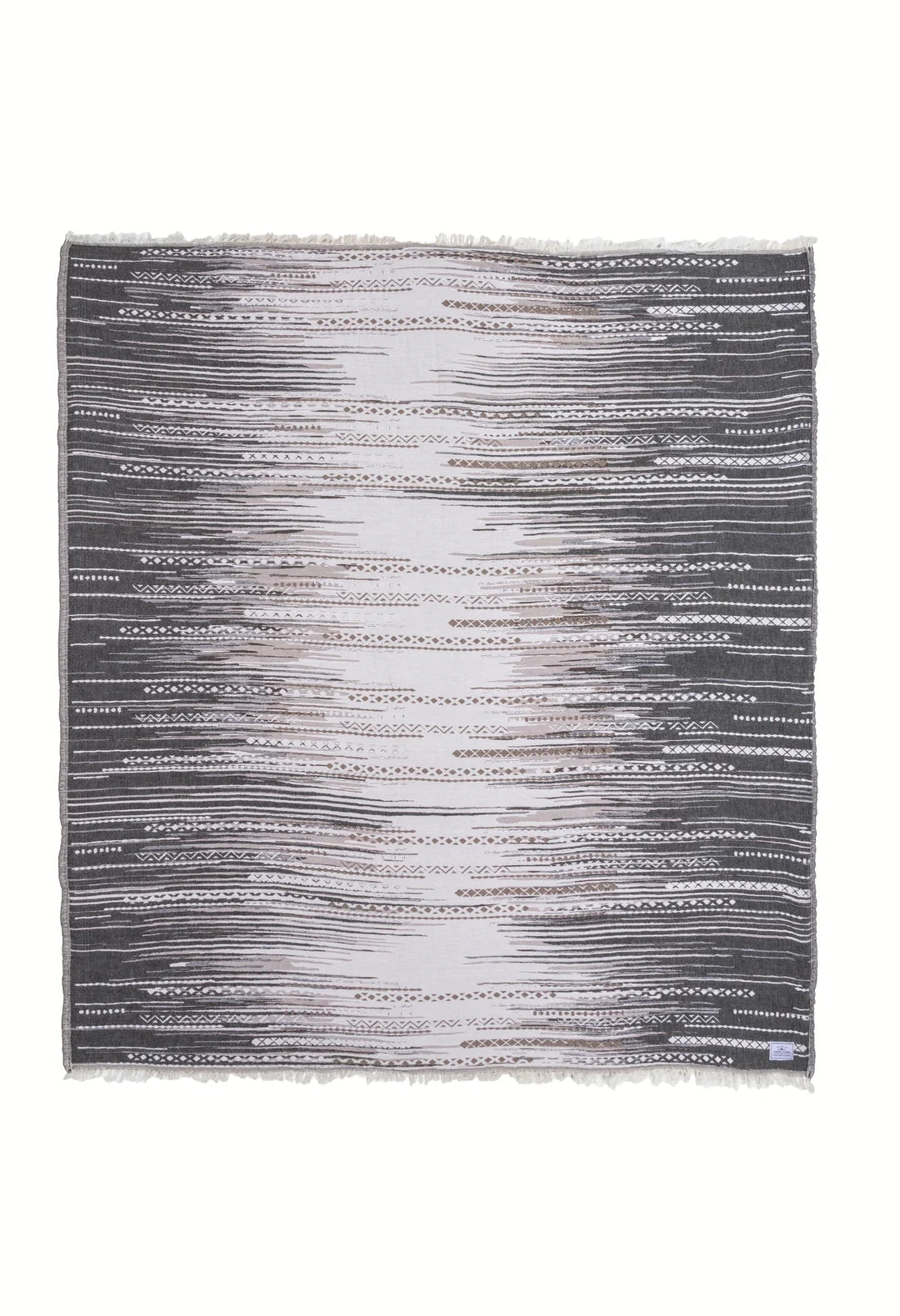 The Chara Fleece Lined Throw
